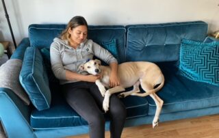 Scooby, who has the canine equivalent of IBS in humans, gets a cuddle from his new owner Kiron Montford.